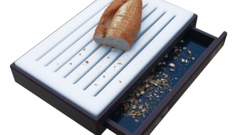 Bread cutting board with crumb compartment